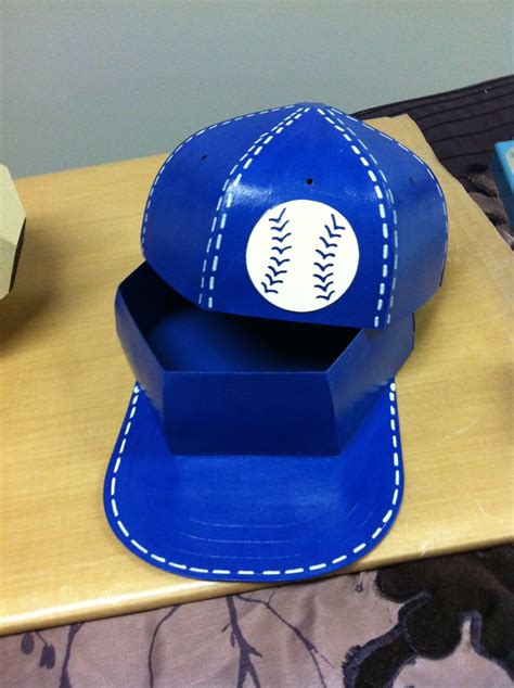 This favor box is a guaranteed hit among the baseball and softball fans and players in your life! Boys Blue baseball Hat gift box | Manualidades, Cajas ...