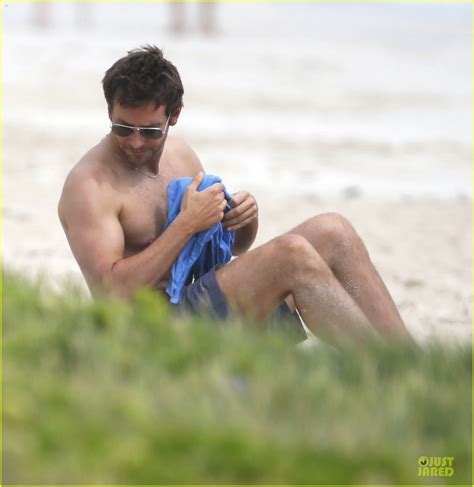Bradley Cooper Shirtless Relaxing Beach Stud In Hawaii Photo