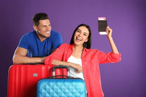 Couple With Suitcases For Summer Trip On Purple Background Vacation Travel Stock Image Image