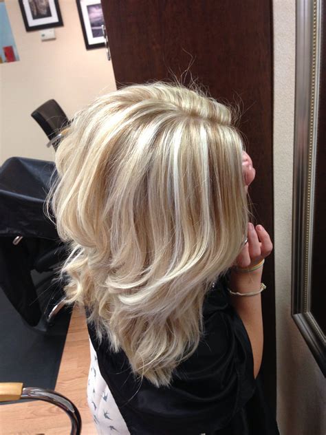 Just like when you lighten your hair, going darker may also necessitate a trip to the salon. Cool blonde with lowlights #daisysalon I'd like this with ...