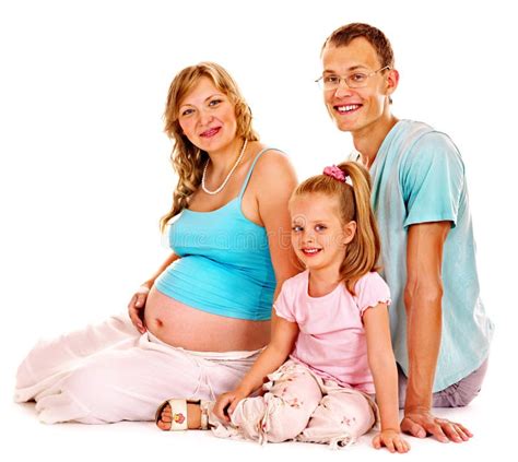 Mujer Embarazada Con La Familia Foto De Archivo Imagen De Hombres