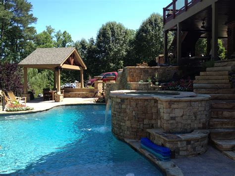 Beautiful Example Of Stack Stone Around Spa Pool Walls And Cabana By
