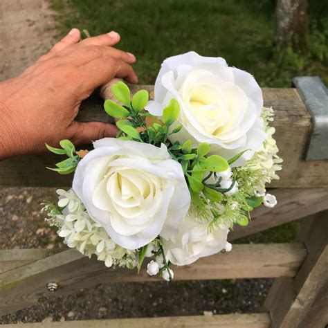 A Wedding Bouquet Collection Of Ivory Silk Roses And Lily Of The Valley
