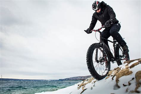 Extreme Sport Winter Mountain Bike Rider On Fat Bike In Snow Del