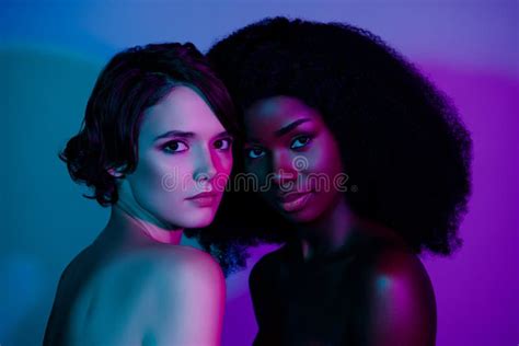 Portrait Of Two Affectionate Tempting Women Bonding Flirty Isolated Over Vivid Violet Purple