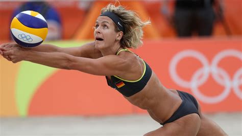 Why Do Olympic Beach Volleyball Players Wear Bikinis Uniform The Best