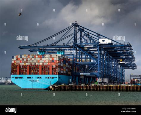 Uk Foreign Trade Shipping Containers Being Loaded And Unloaded From A