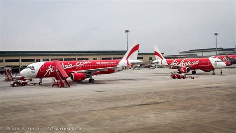 The following airlines fly this route: Air Asia aircraft on the tarmac at the Low Cost Carrier ...