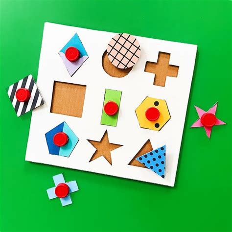 Check out this collection of cardboard projects that are easily reproducible at home with common household materials including games, puzzles, toys, costumes, and even a playhouse. Make: A Modern DIY Cardboard Shape Puzzle - barley & birch