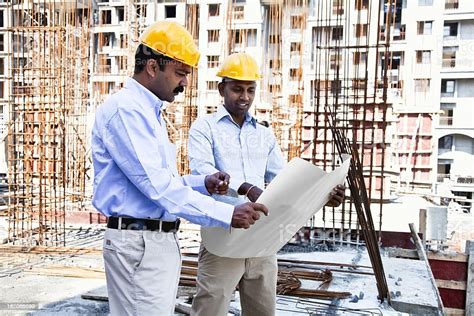 Indian Engineer Architect On Construction Site Stock Photo Download
