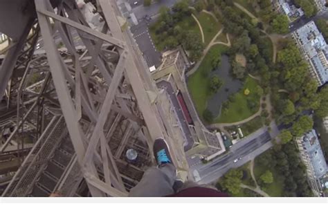 watch this fearless dude climb the eiffel tower