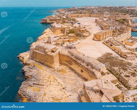 Ancient Stone Military Fort Malta Island Made Of Brick Rocks On Shore