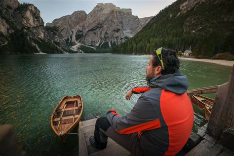 Man Seating On Boat On Lago Di Braies Italien Dolomites Travel And