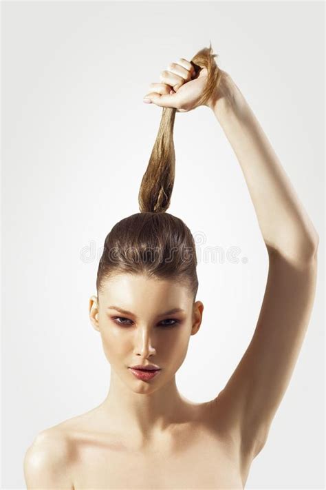 Young Beautiful Woman Holds Her Hand Long Hair Up Stock Image Image Of Emotion Makeup 104131567