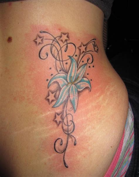 Https://tommynaija.com/tattoo/flower With Stars Tattoo Designs