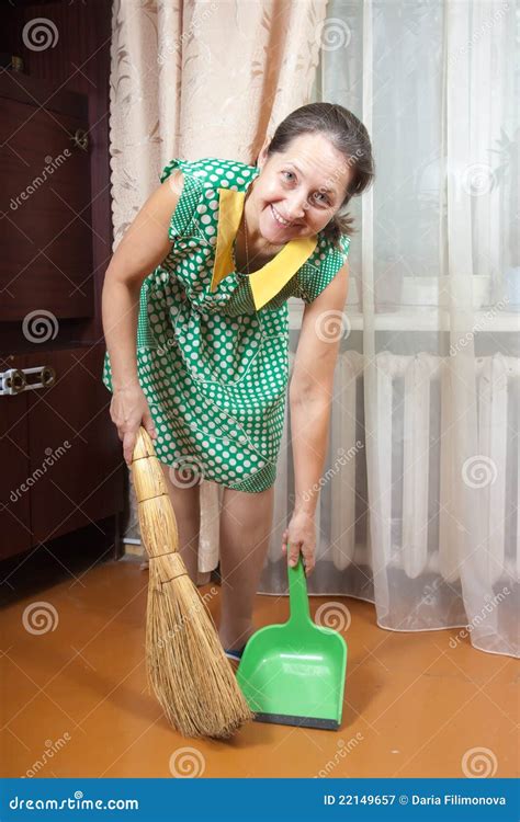 Woman Cleaning Floor With Dustpan Stock Image Image Of Looking