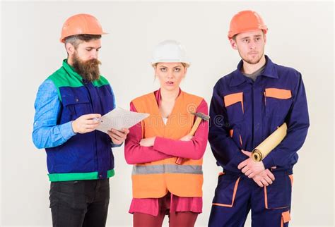 Men And Woman In Helmets Architects On Confused Face Stock Image Image Of Constructor