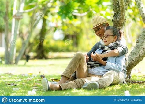 Asian Lifestyle Senior Couple Hug And Sitting Stock Image Image Of