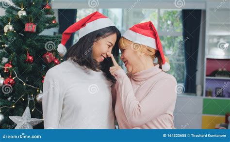 Asian Lesbian Couple Celebrate Christmas Festival Lgbtq Female Teen Wear Christmas Hat Relax