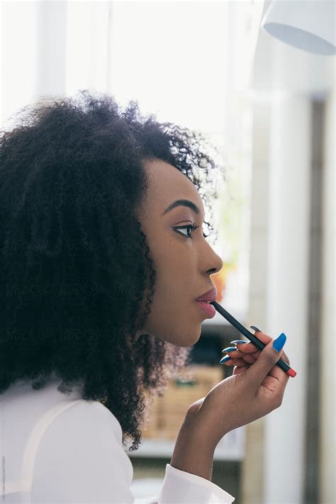 Black Woman Putting On Lipstick Lipstutorial Org