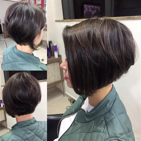 For this cut, the face is a little longer, so adding longer bangs help frame it better. Short Brunette Stacked Bob with Front Fringe - The Latest ...