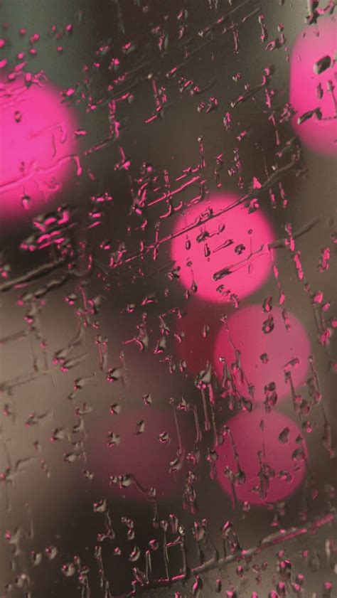 Rain On Glass Pink Lights Iphone Wallpaper Rainy Glass Pink