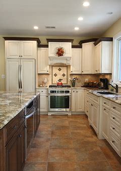 Cuts are made while crown molding is upside down. Crown Molding on Kitchen Cabinets - Yes or No?