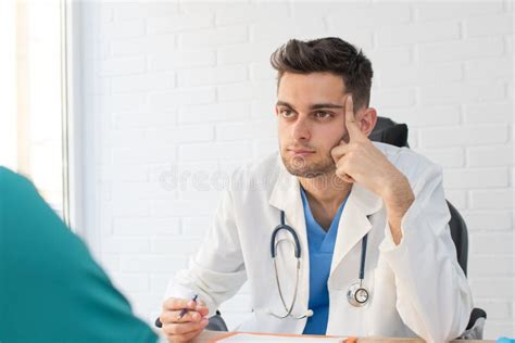 Doctor In Consultation With Patient Stock Photo Image Of Office