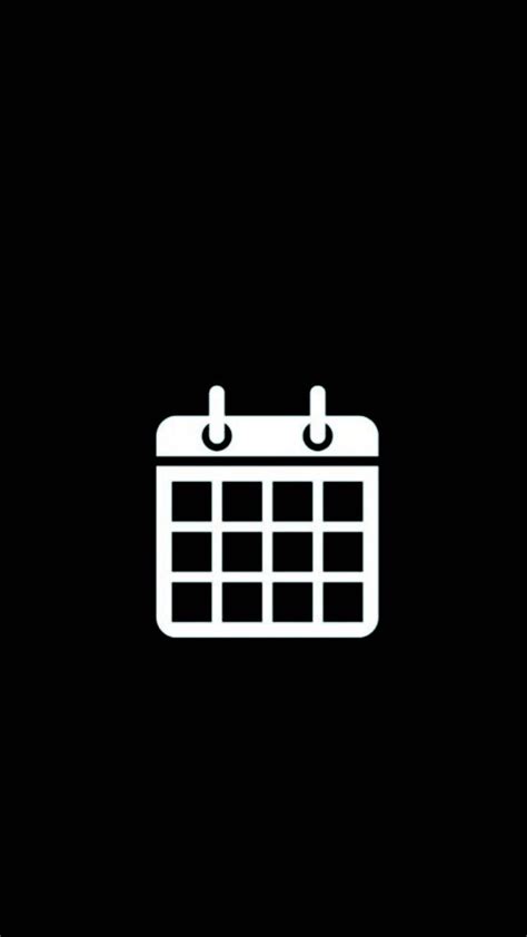 A Black And White Calendar Icon On A Dark Background With Space For