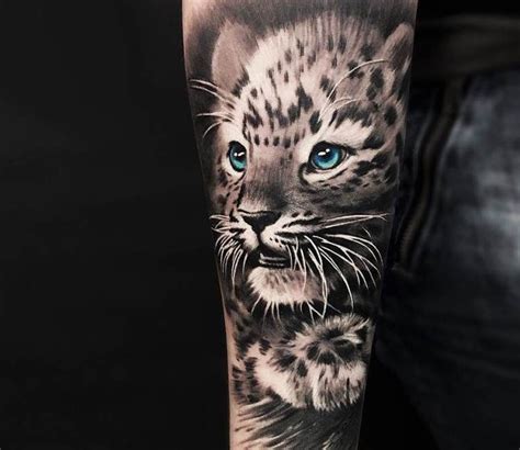 Perfect 2 Colors Realistic Tattoo Style Of Snow Leopard With Blue Eye