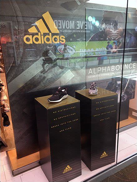 Adidas Swift Dual Pedestal Shoe Display Fixtures Close Up