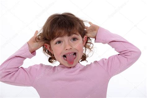 Little Girl Making A Funny Face — Stock Photo © Photography33 9767269