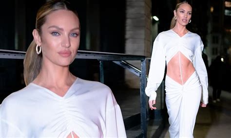 Candice Swanepoel Displays Toned Abs In Quirky White Dress That Bares