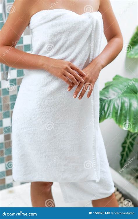 A Woman In A Bath With Towel Girl Shows Hands In Form Heart Skin