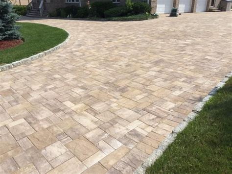 Natural paving stones come in various shapes, colors, and textures from materials such as travertine, granite, flagstone, marble additional patio paver options. Cambridge's Ledgestone Collection pavers in Sahara ...