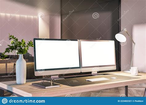 Modern Office Interior With Desk Top Blank White Computer Monitors And