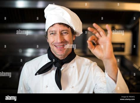 Portrait Of Happy Male Chef Showing Ok Sign Stock Photo Alamy