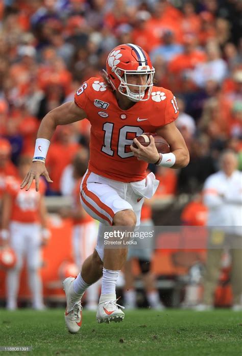 trevor lawrence of the clemson tigers drops runs with the ball clemson clemson football