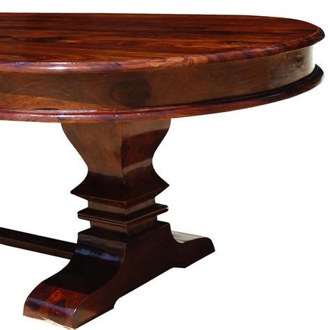 Looking to spruce up your dining area? Tuscan Trestle Solid Wood 104" Oval Dining Table