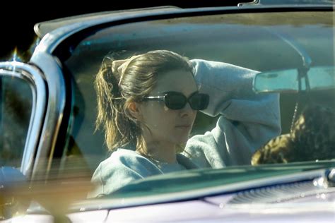 KENDALL JENNER In Her Purple Cadillac Eldorado Convertible Driving Out In Los Angeles