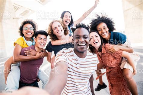 Multicultural Happy Friends Having Fun Taking Group Selfie Portrait On City Street Young Diverse