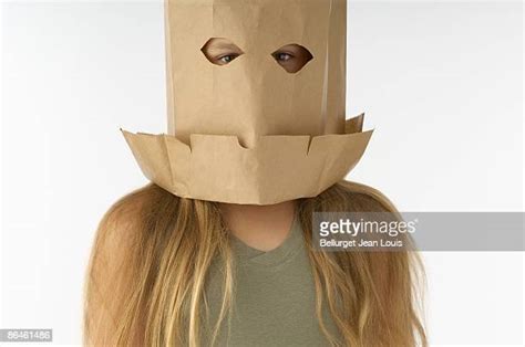 Paper Bag Head Girl Photos And Premium High Res Pictures Getty Images