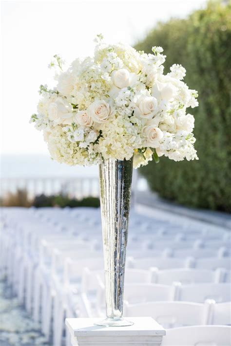 Tall White Rose And Hydrangea Centerpiece In A Silver