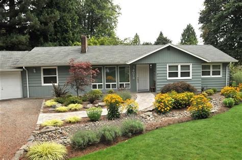 The shrubs, small trees, and hedges play a very important role in giving symmetry to the home, and the better the symmetrical fashion the better the. landscaping ideas for rambler home - Google Search | Ranch house landscaping, Home landscaping ...