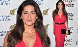Casey Batchelor Puts Her Surgically Reduced Cleavage On Display At