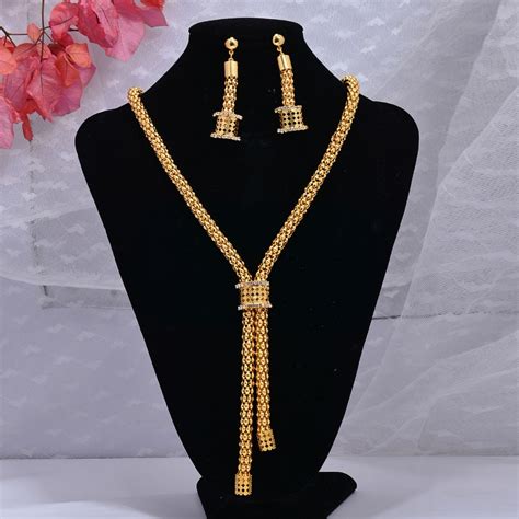 Parure spirale plaqué Or 24k et cristaux - FEMME
