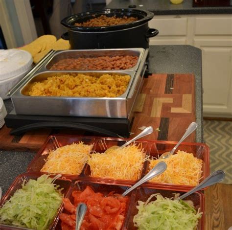 A Taco Bar The Easiest Way To Feed A Crowd Styleblueprint Recipe Party Food On A Budget