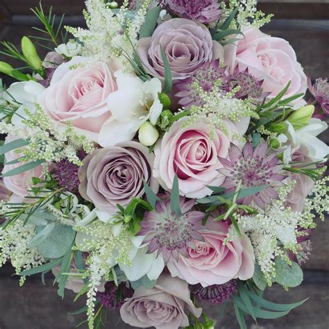 Maybe you would like to learn more about one of these? Purple and pink wedding bouquet (Artisan House of Flowers ...