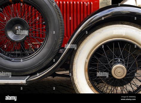 Antique car fender and wheels Stock Photo - Alamy