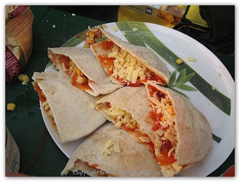 Place the pita bread pizza on top of the parchment. CAMPFIRE RECIPE: PIZZA POCKET — Wild Night Out